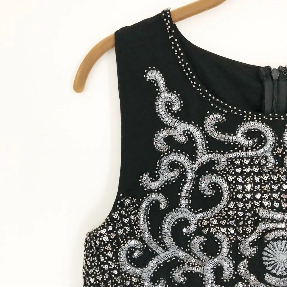 Francesca’s sequin pop-over dress Black Sz M